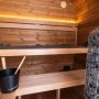 Holl’s Onyxia buitensauna interieur saunastenen